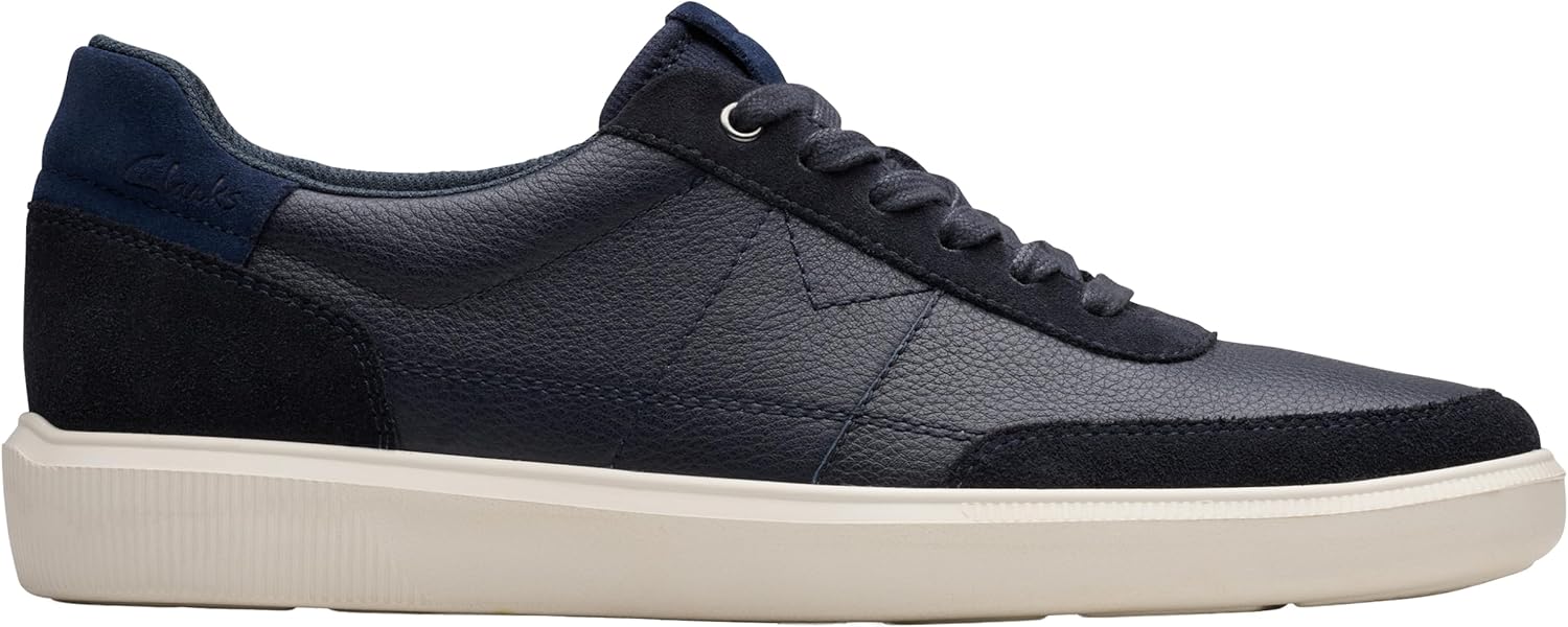 Pavo Monitor Arm installed on a wooden office desk