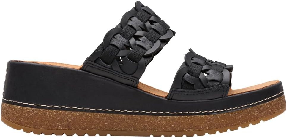 Pavo Monitor Arm installed on a wooden office desk