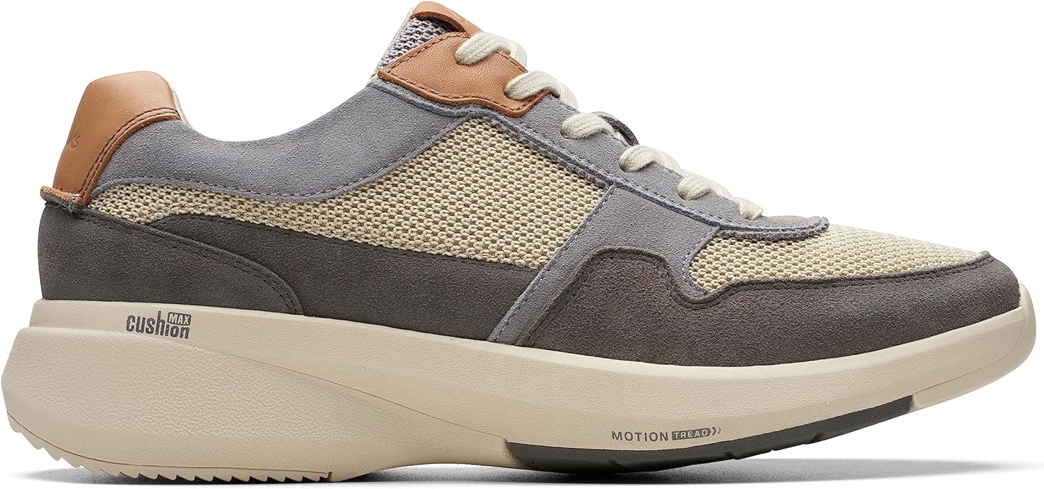 Pavo Monitor Arm installed on a wooden office desk