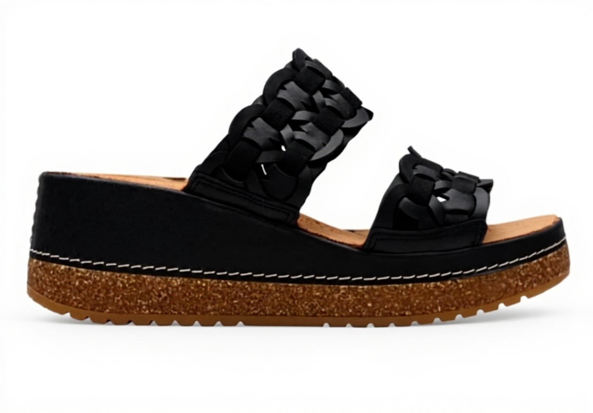 Pavo Monitor Arm Ergonomic Aluminum Desk Mount installato su una scrivania in legno chiara in un ufficio domestico