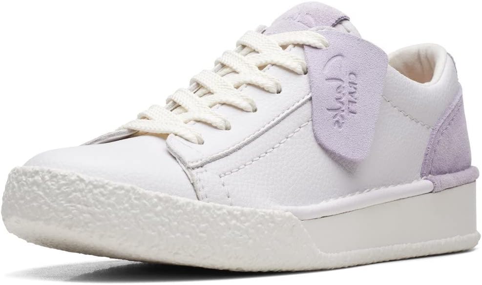 Pavo Monitor Arm installed on a wooden office desk