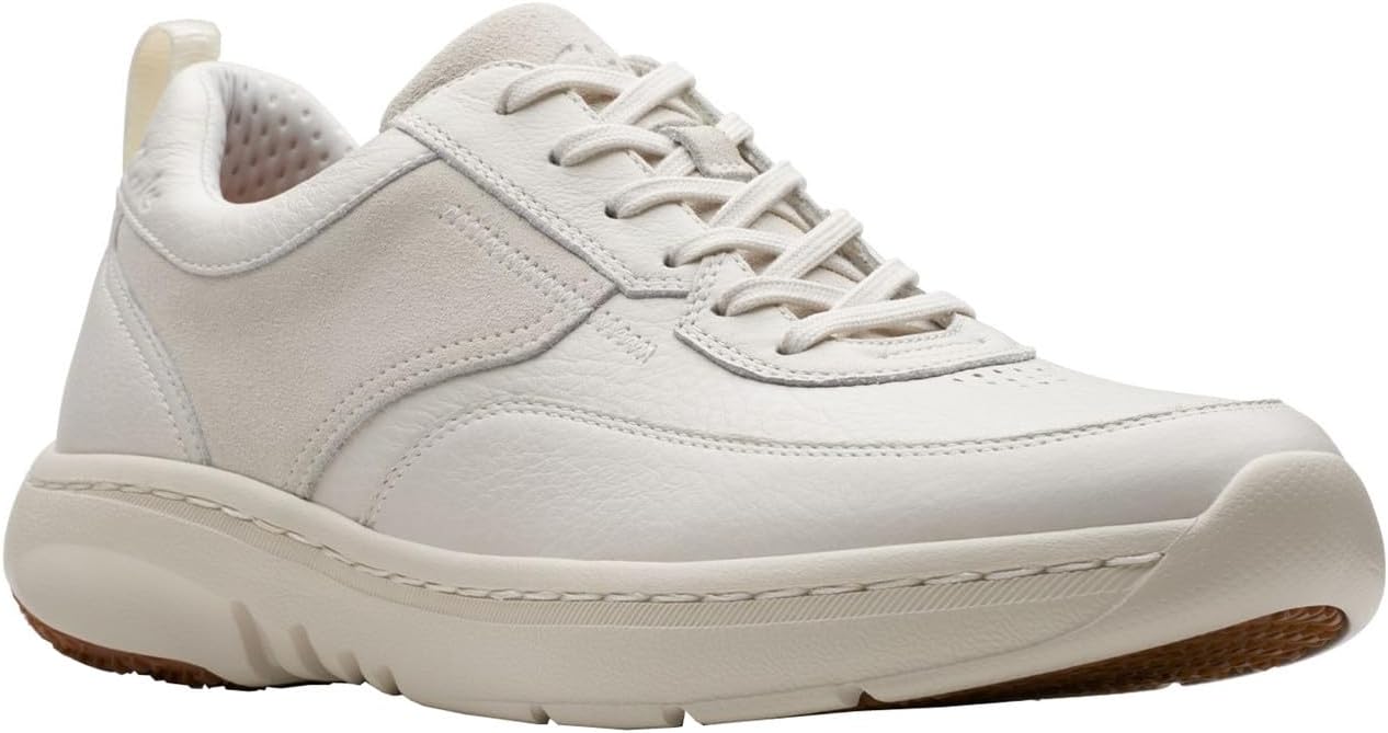 Pavo Monitor Arm installed on a wooden office desk