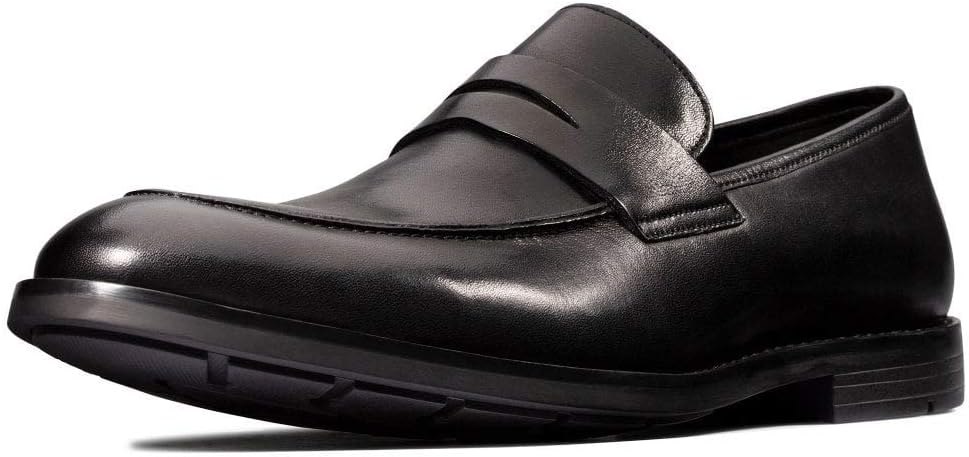 Pavo Monitor Arm installed on a wooden office desk