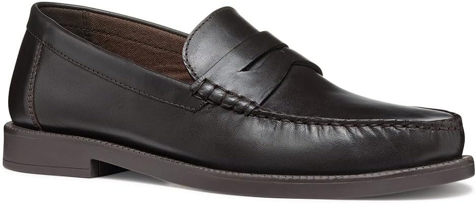 Pavo Monitor Arm installed on a wooden desk with adjustable screen positioning